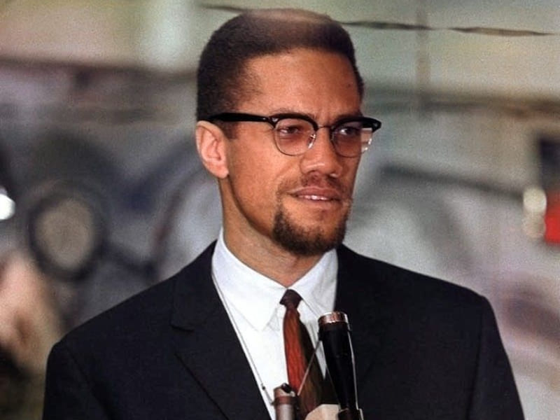 Malcolm X delivering a speech